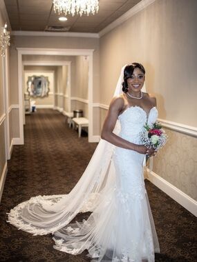 Beautiful Blue by Enzoani Olenka Wedding gown with flattering strapless mermaid